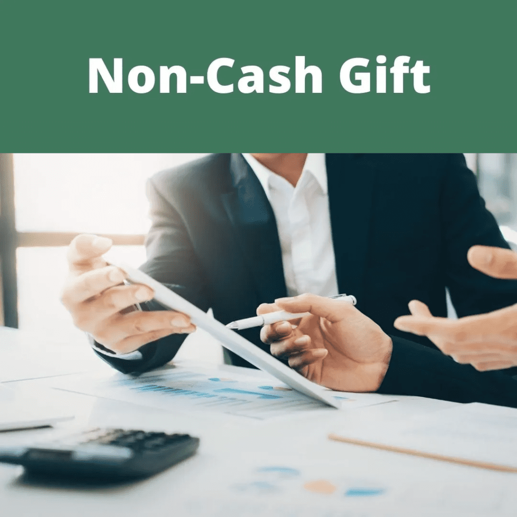 Businesspeople discussing non-cash gift.
