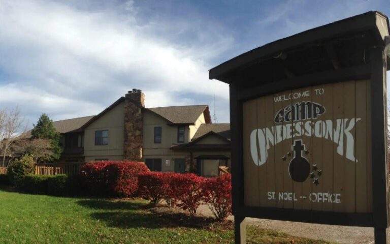 Camp Ondessonk office sign with lodge