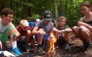 Building a community: Boys in the woods