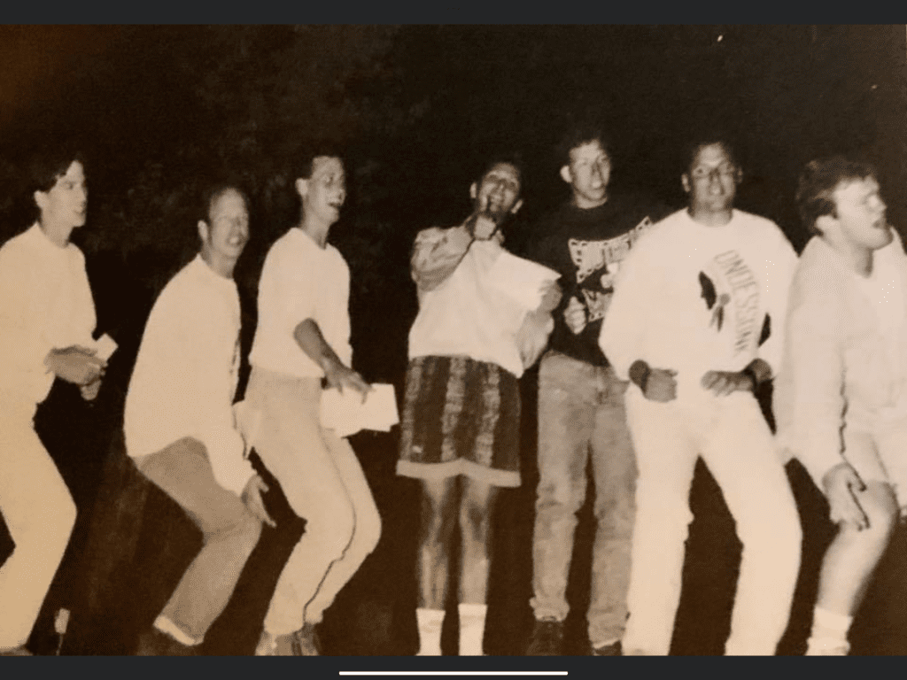 Group of young men posing for a photo.