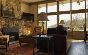 Cozy living room with stone fireplace.