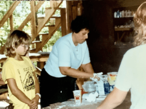 Three people working with plaster.