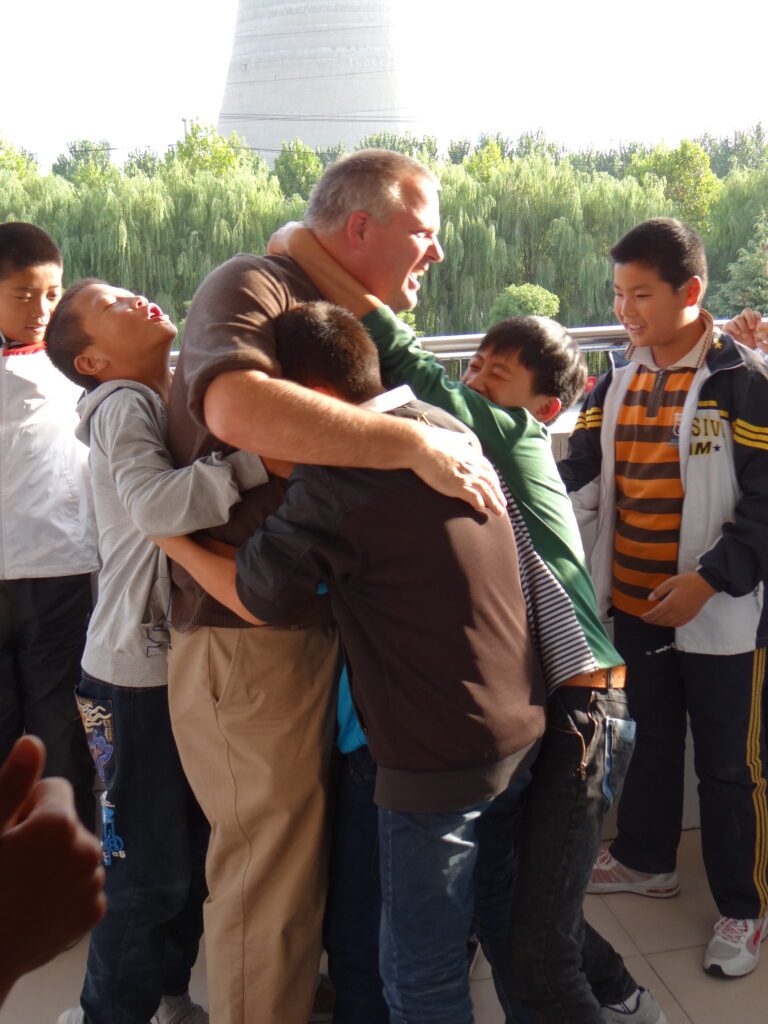 How 'Heepwah' Bridged Cultures: My Journey Teaching in China and the Lasting Impact of Camp Ondessonk