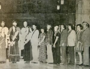 Group of people pose for a photo.