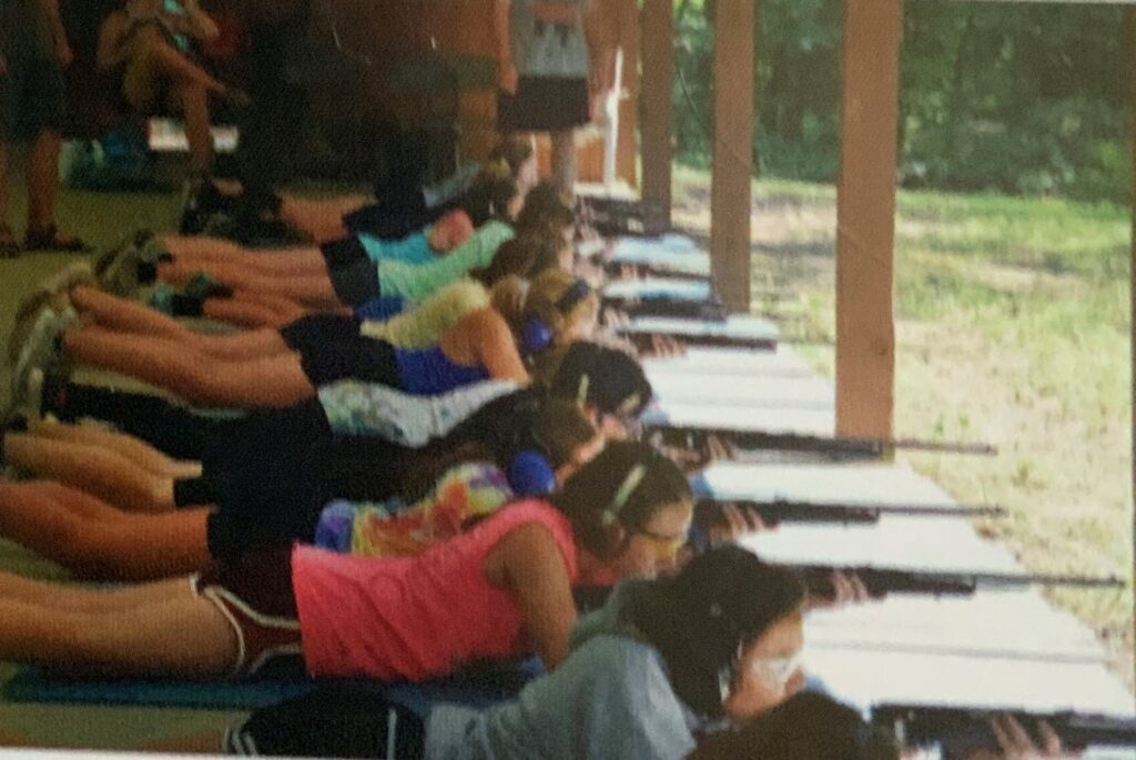 People shooting rifles at a range.