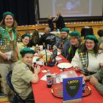 Group of scouts at a dinner table.