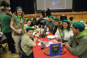 Group of scouts at a dinner table.