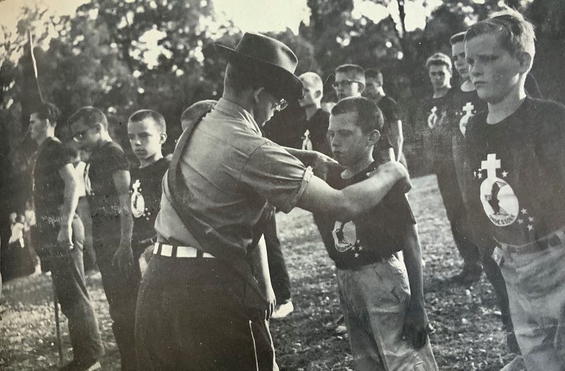 Black and white photo of a scout ceremony.