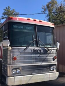 Vintage MCI bus, Undispunk Frontier.