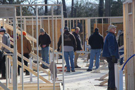 Mike and His Amazing Volunteers.  Volunteers working on the staff duplex at Camp Ondessonk