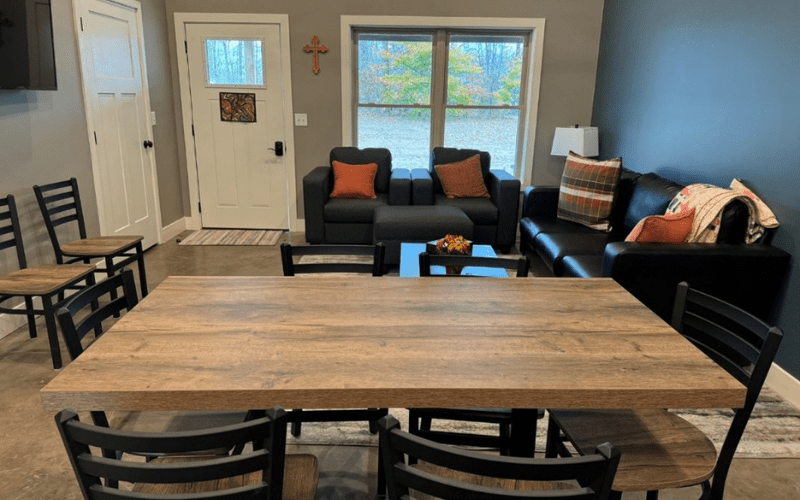 Living room with wood dining table.