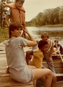 Boys at summer camp by the lake.