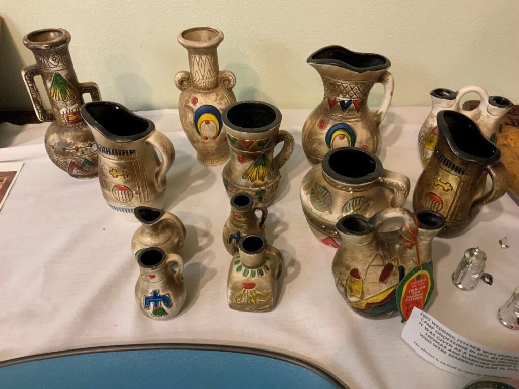 Collection of small, decorative, hand-painted pottery.