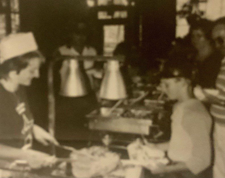 Travel Back in Time To 1973.  Campers having a meal.